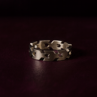 Silver ring on a dark background