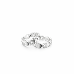 Silver ring with a unique design on a white background