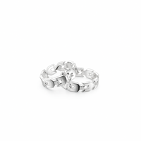Silver ring with a unique design on a white background